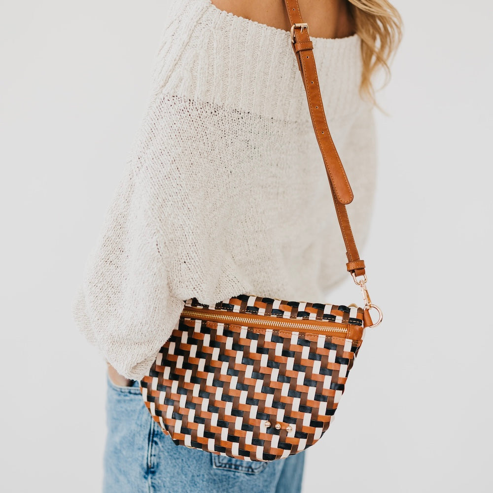 Multi-brown woven bum bag with diagonal strap and zip top, gold hardware