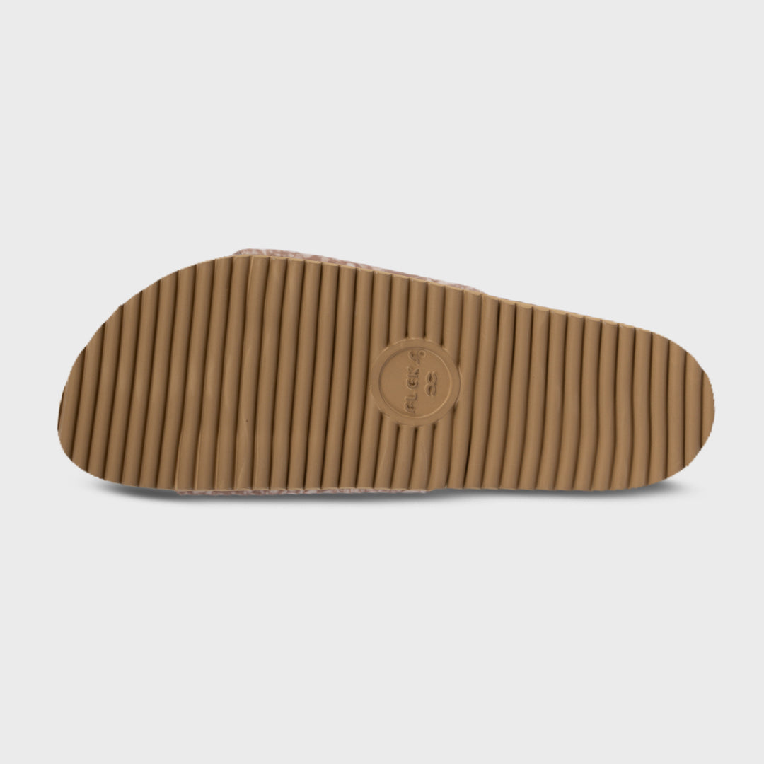 Blushed slide sandals outsole with textured tread and center logo mark
