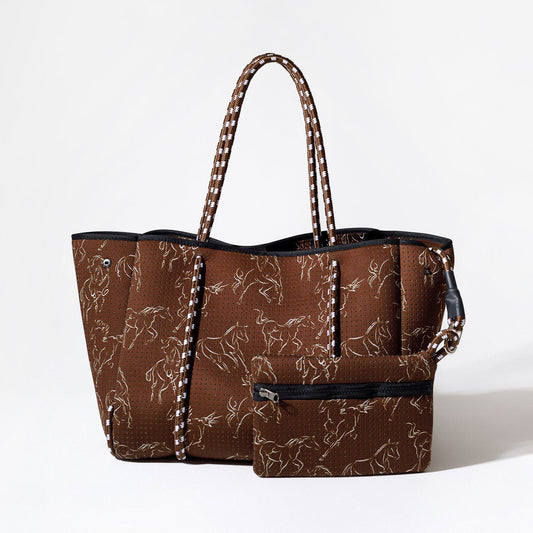 Brown horse-print tote bag with striped rope handles, black top trim, and side pocket