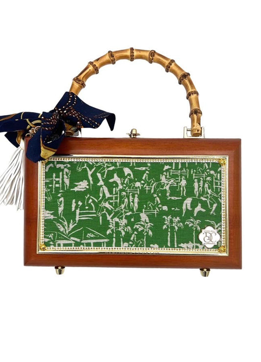 Brown toiletry bag with bamboo handles, green equestrian print front, gold crest, brass hardware