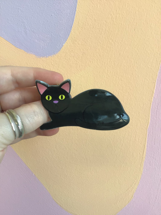 Black cat hair claw clip with green eyes and pink inner ears