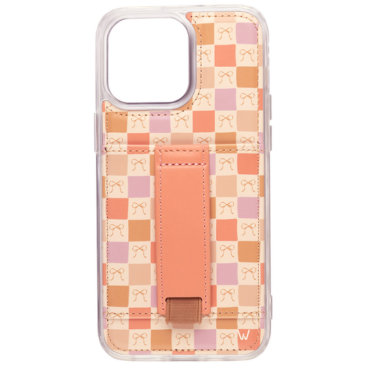 Clear phone case with peach bow pattern and tan strap, snug cutouts