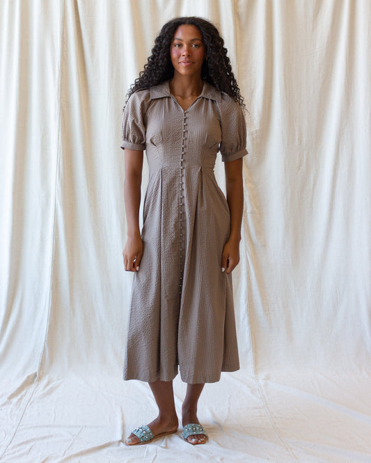 Taupe/brown midi field dress with short puff sleeves and vertical button-front