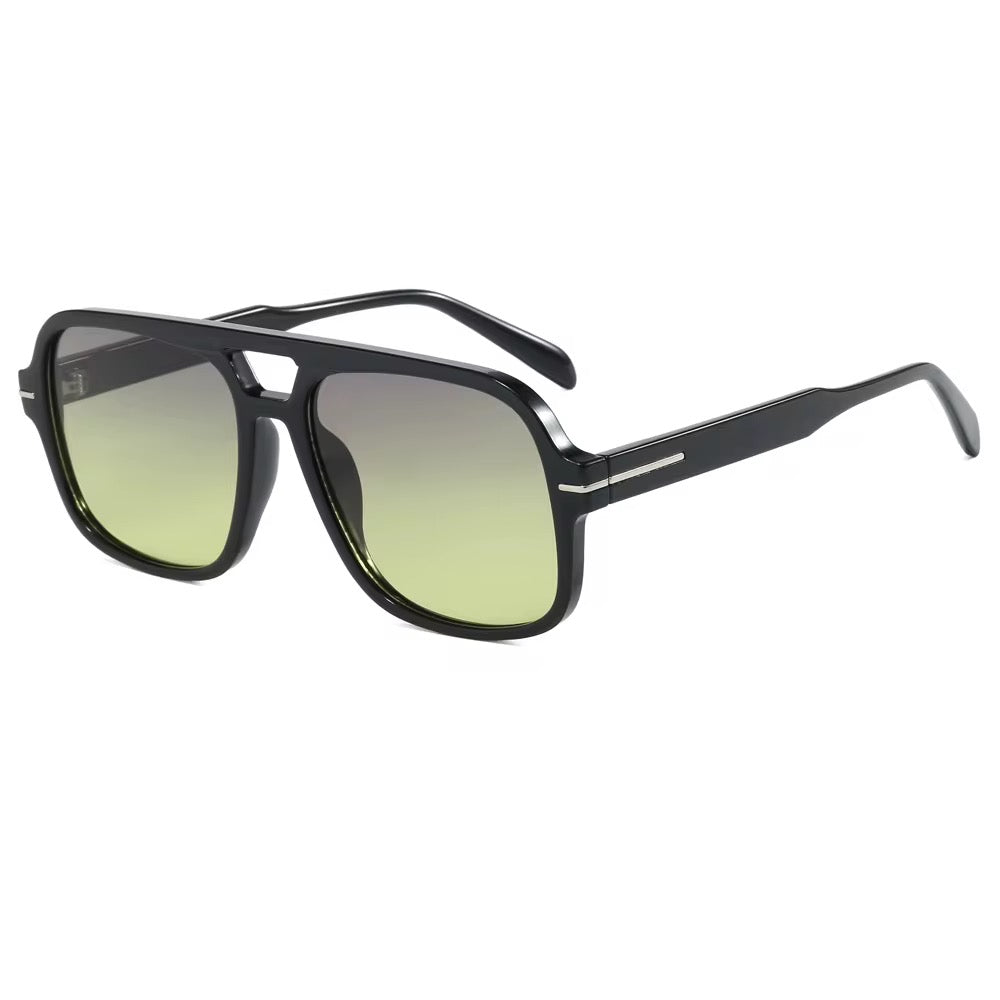 Oversized aviator sunglasses with black frame and green tinted lenses
