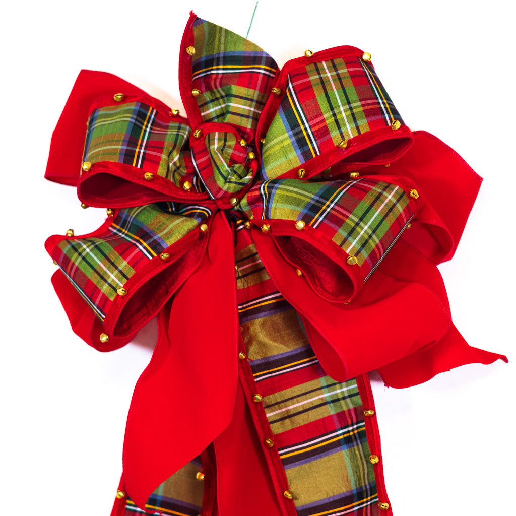 Plaid and red ribbon bow with layered loops and gold-studded bell edges