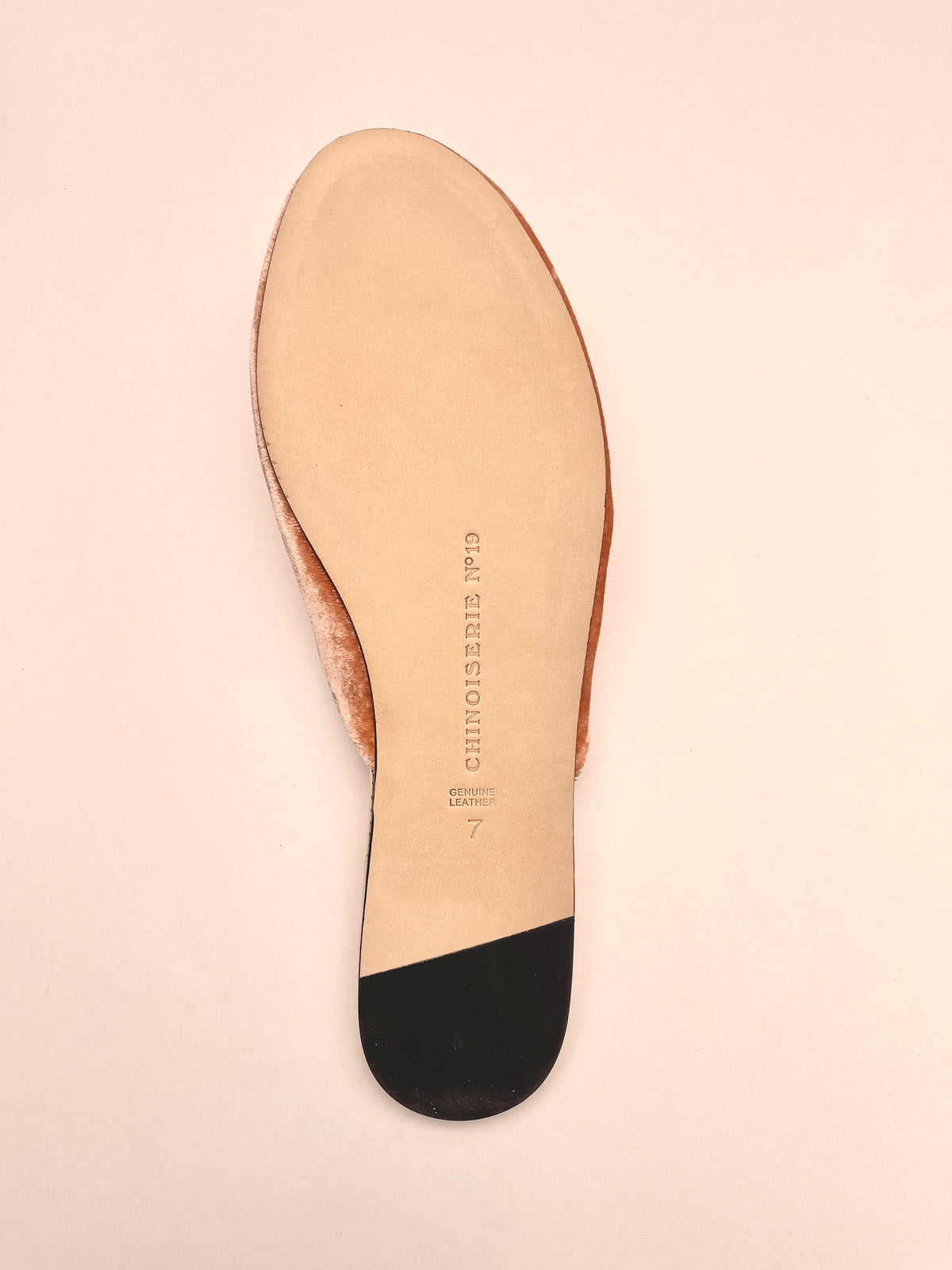 Peach velvet mule sole with black heel insert and light suede footbed
