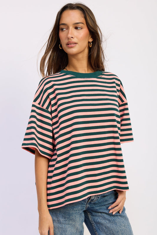 Nerissa oversized top with green and pink horizontal stripes, relaxed short sleeves