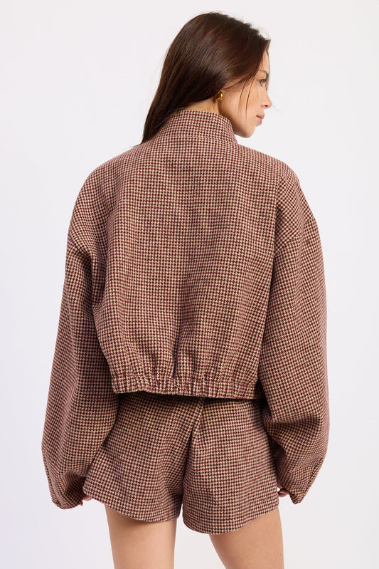 Charlee houndstooth jacket back view with elastic waist and long sleeves
