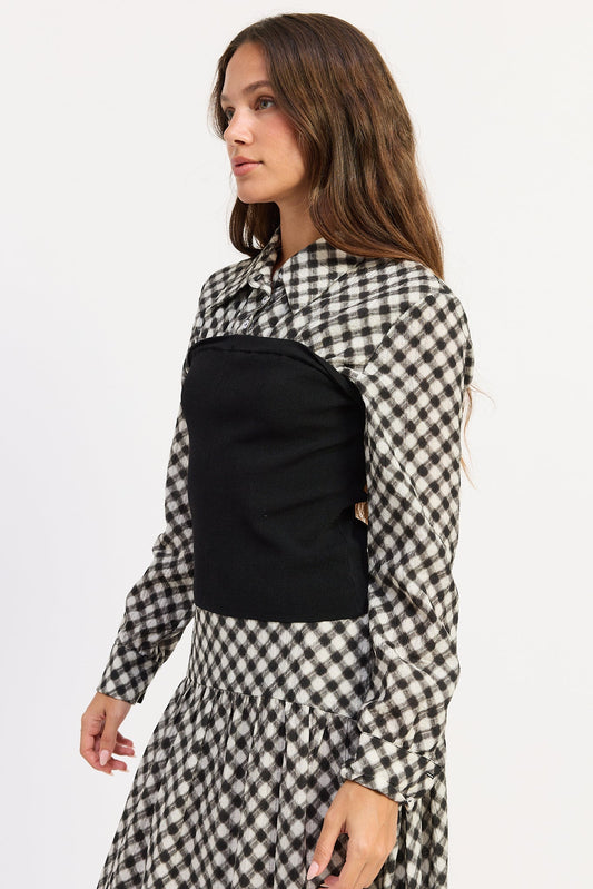 Gingham button-up top with black strapless-style bodice panel and long sleeves