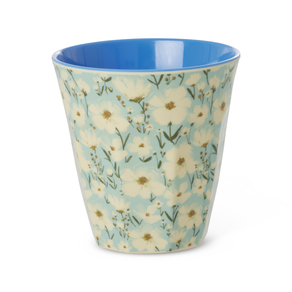Melamine medium cup with blue interior and pale yellow floral print