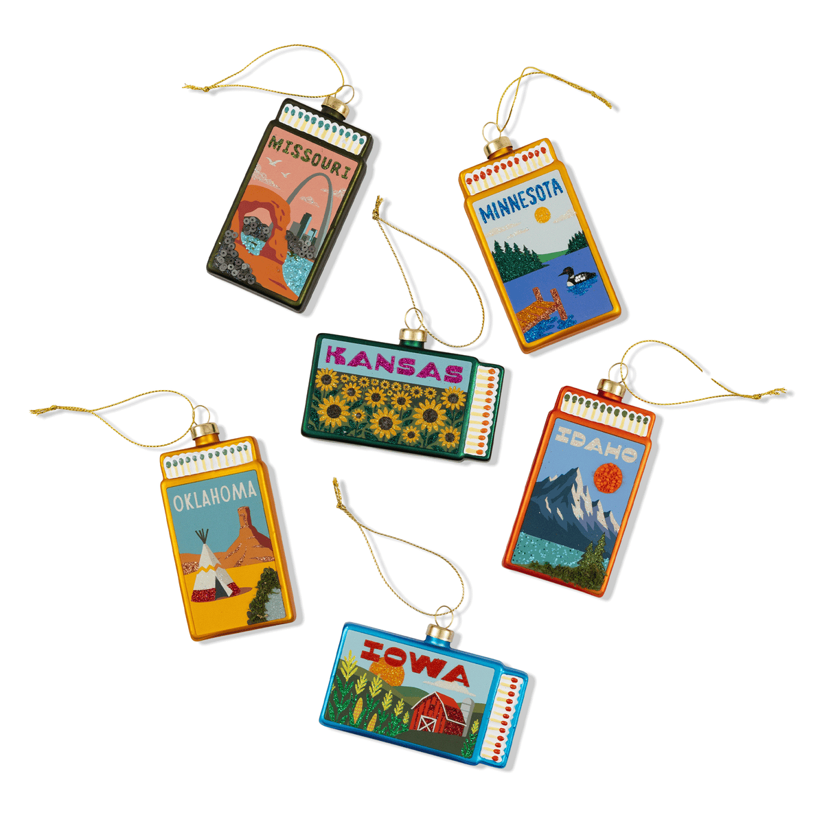 Matchbook-shaped ornaments with colorful state illustrations and hanging cords.