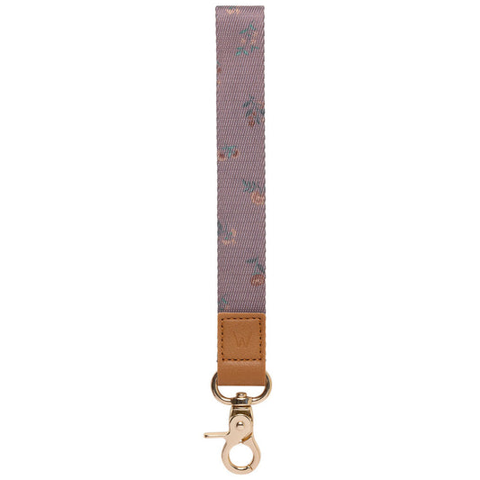 Mauve patterned wrist lanyard with tan leather strap and gold metal key clasp