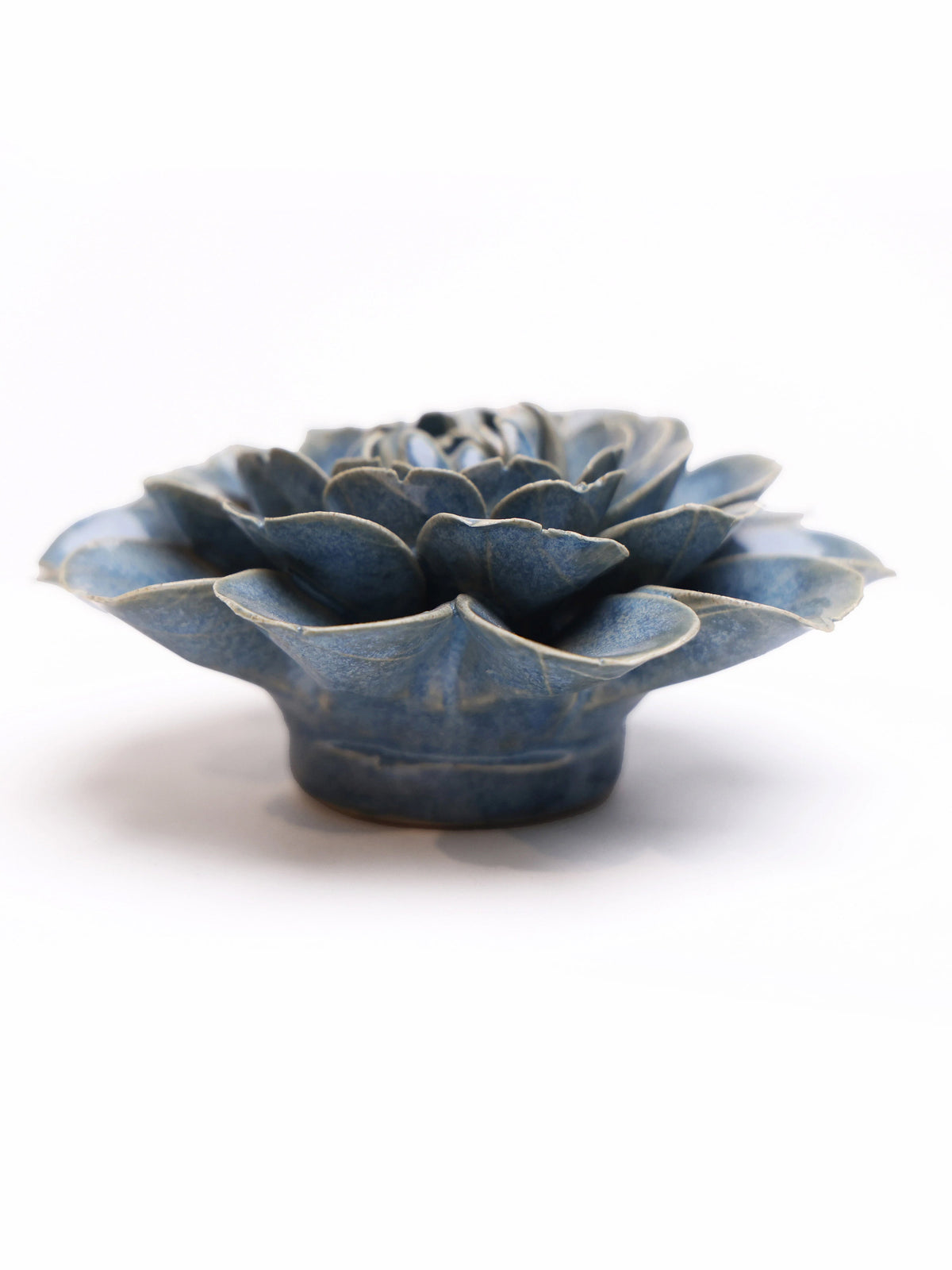 Blue ceramic rose flower decor in shallow bowl form, layered petals