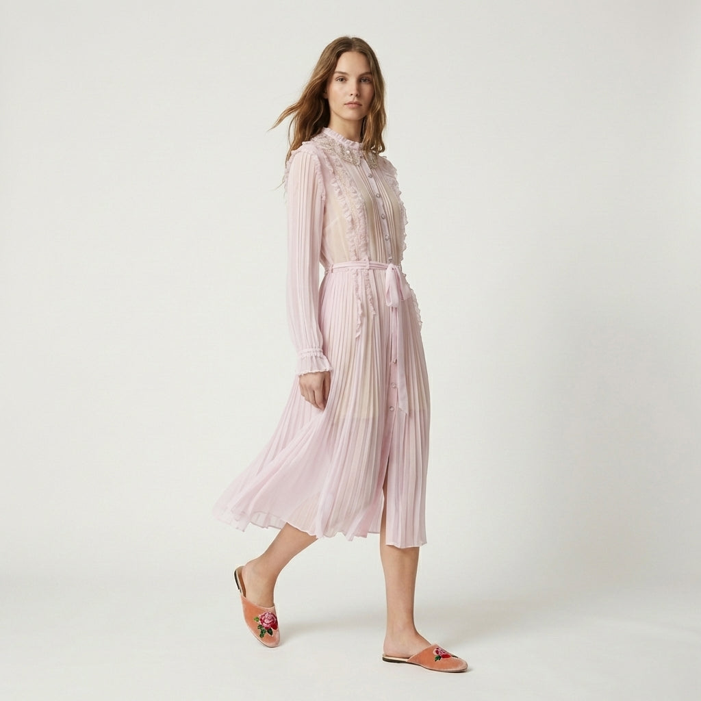 Peach blush velvet mule slippers featuring floral embroidery at the toe strap