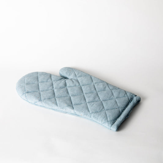Light blue quilted oven mitt trivet with diamond stitch pattern