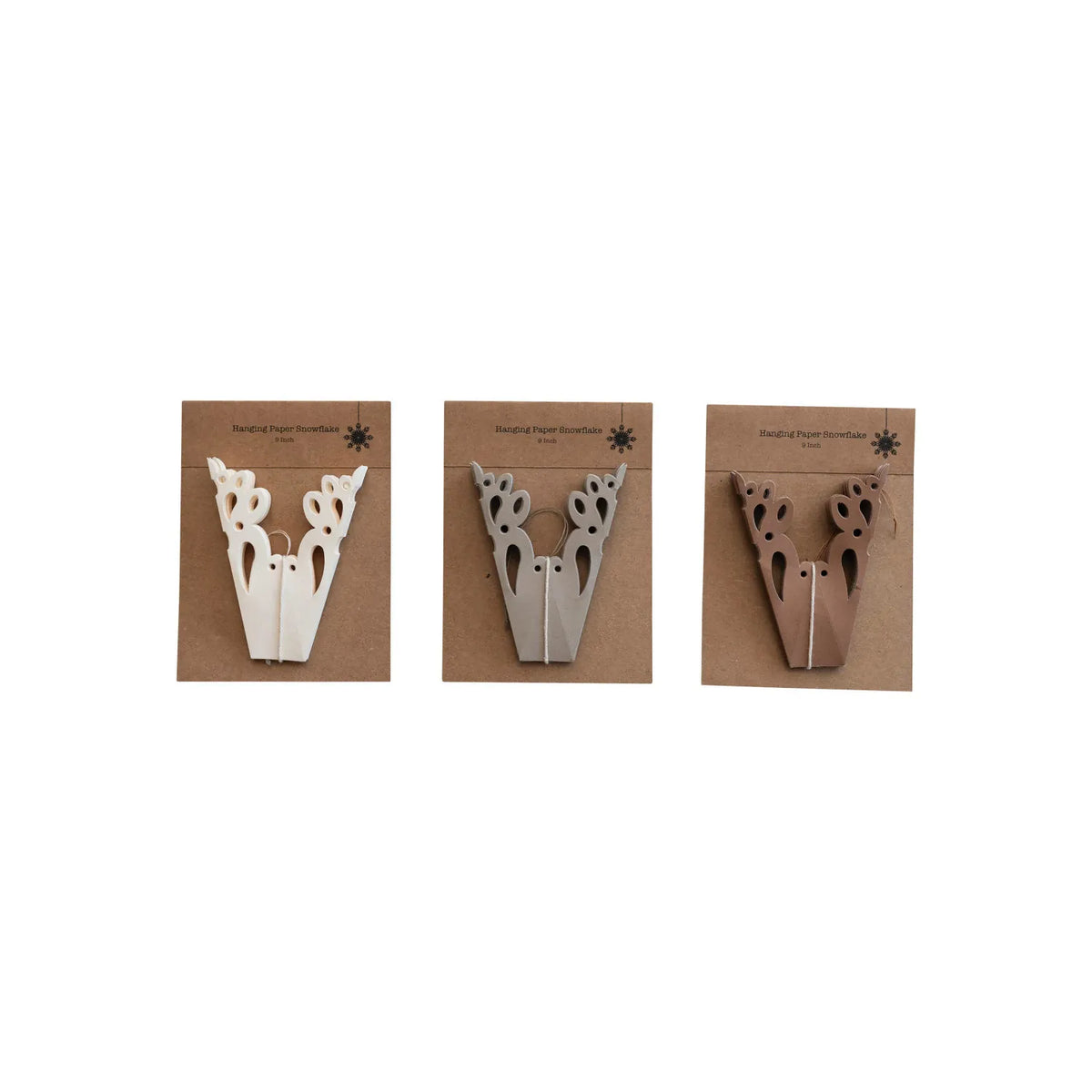 Set of three recycled paper snowflake ornaments in white and brown tones