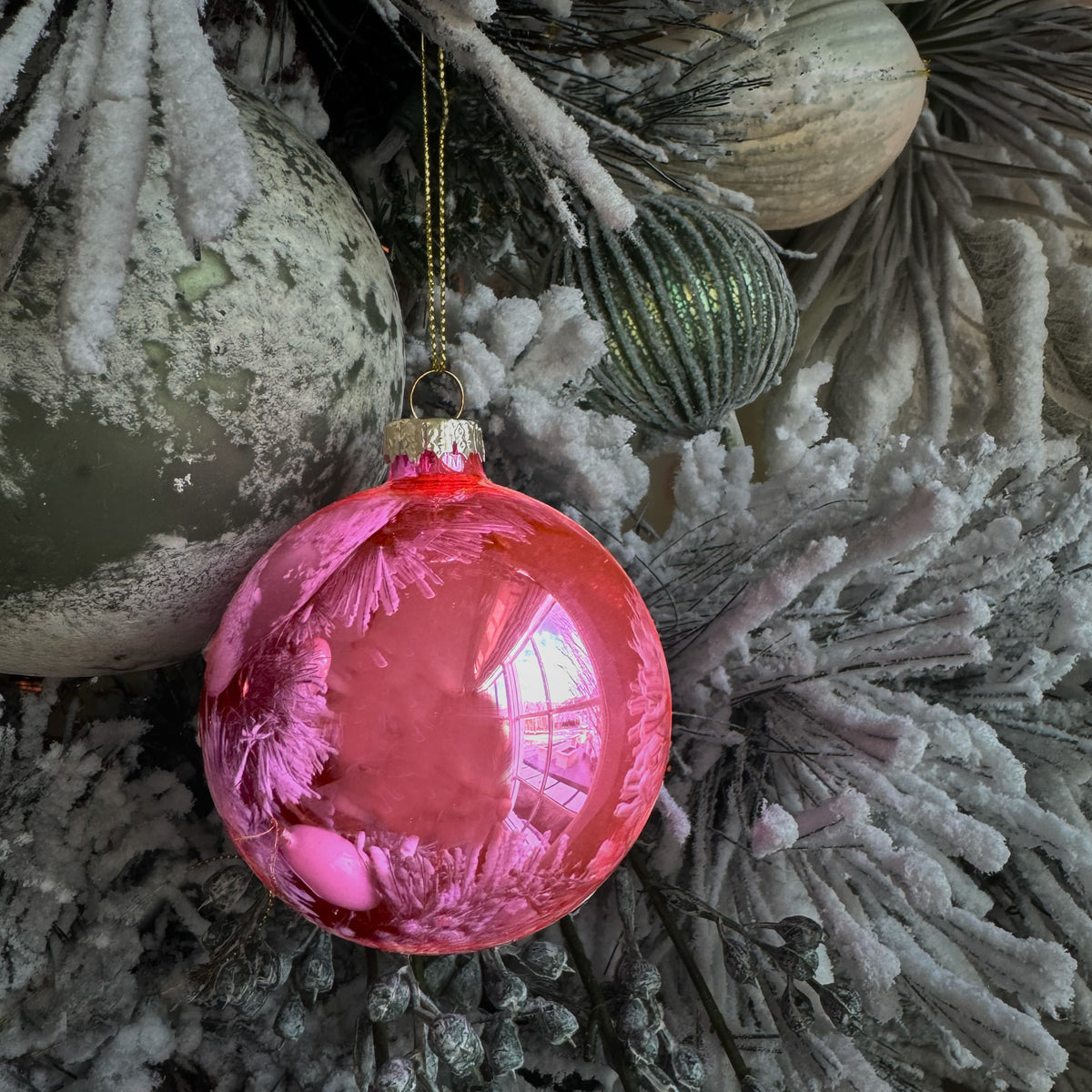 Rose pink glass bauble ornament with gold cap and hanging loop