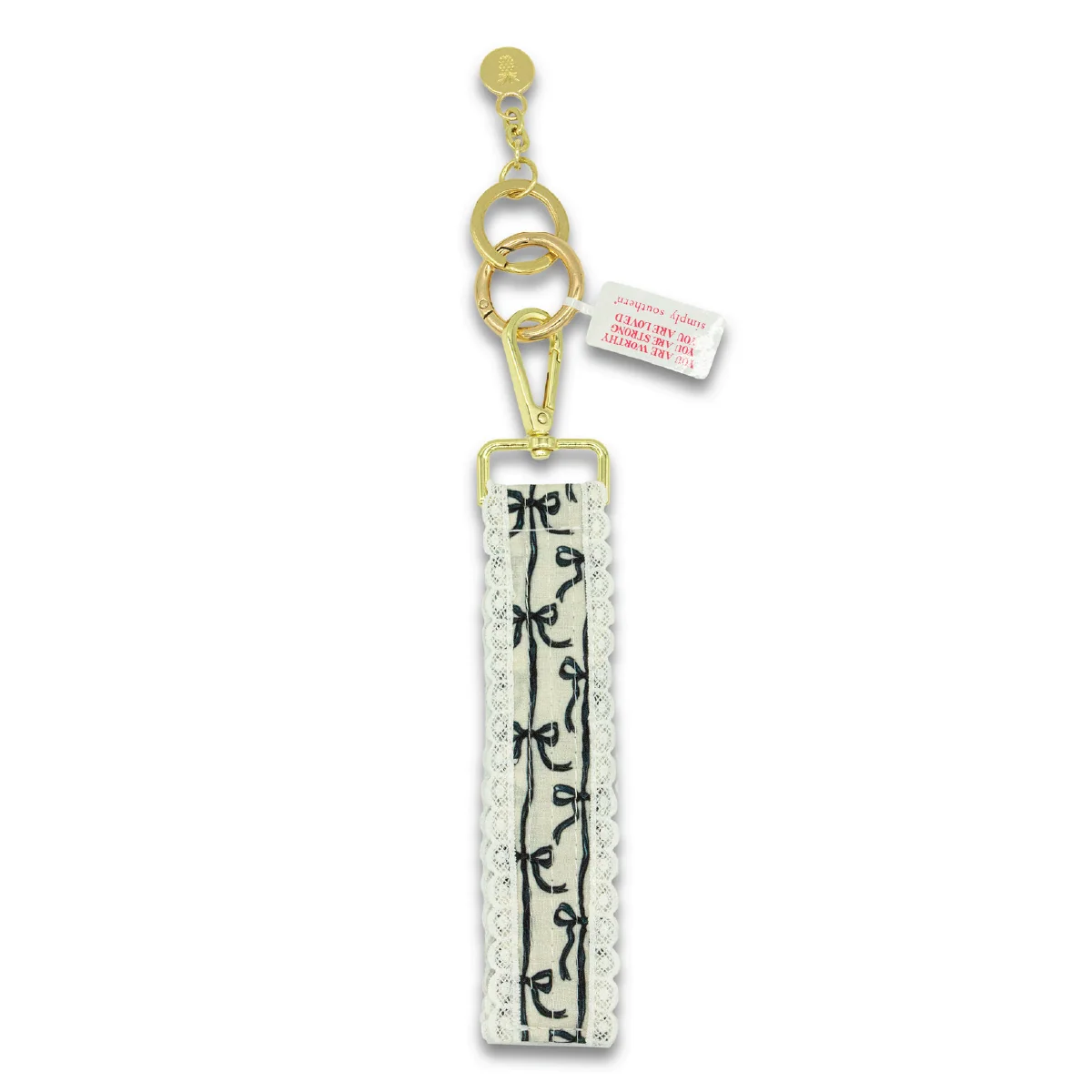 Black lace keyfob with floral motif, gold chain and clasp