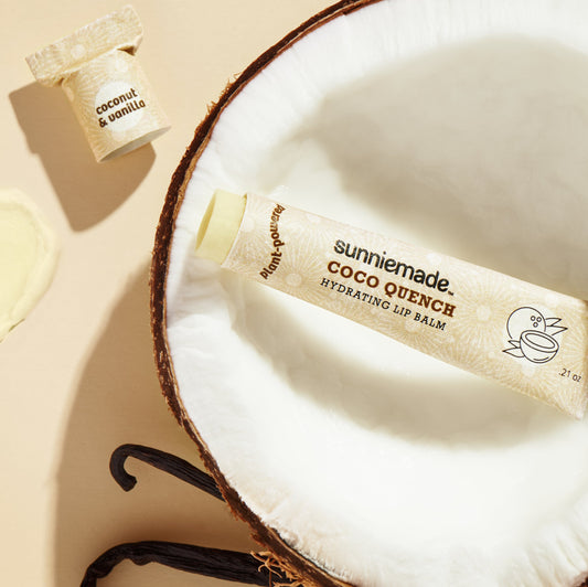Coco Quench hydrating lip balm tube, white label with coconut & sun logo