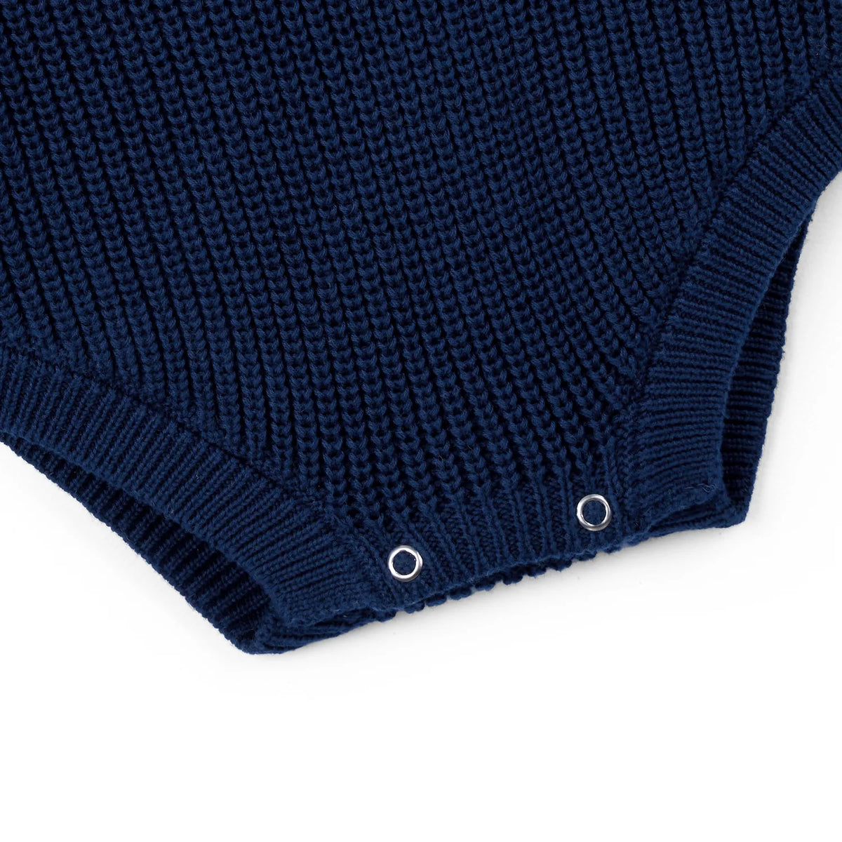 Navy chunky-knit baby romper hem with two snap buttons