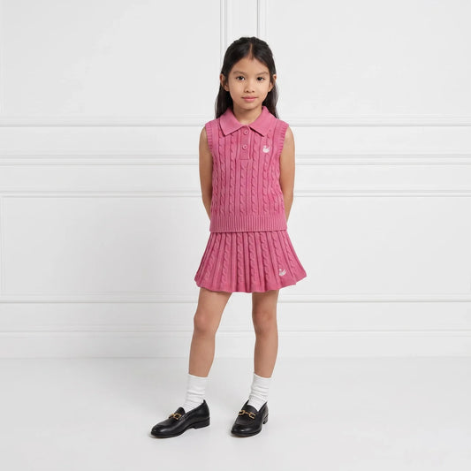Rose pink sleeveless polo on child with knit collar and button front