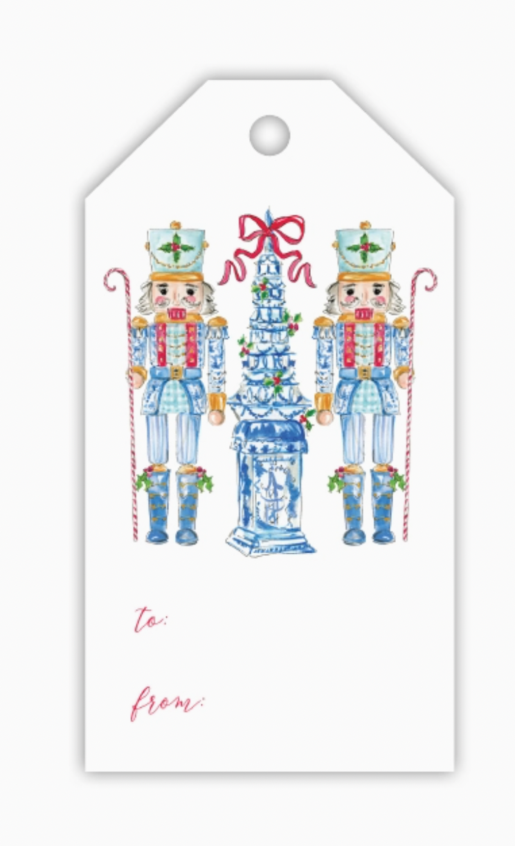 Nutcracker gift tag with two toy soldiers flanking a decorated Christmas tree and To/From lines