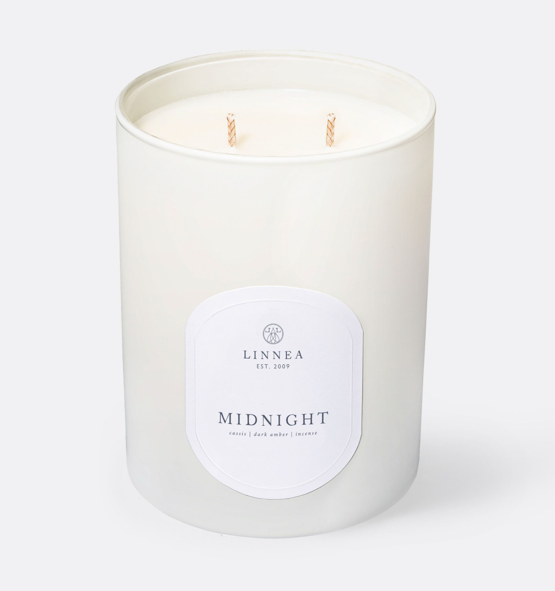 Large 2-wick candle jar with Midnight label and two wicks, pale wax