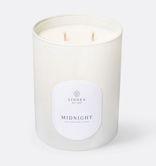 Large 2-wick candle jar with Midnight label and two wicks, pale wax