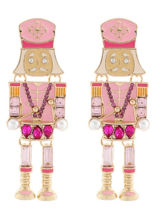 Pair of pink nutcracker earrings with jeweled details and dangling legs