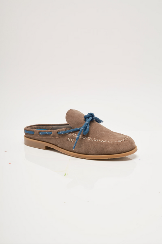 Tan suede mules with blue lace-up tie and stitched moccasin seam