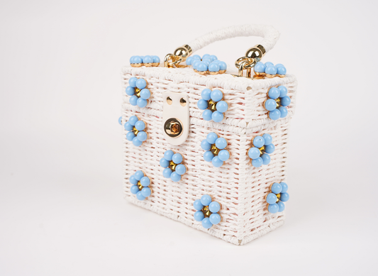 Sea Breeze woven straw handbag, side view, blue beaded medallions and gold-tone clasp