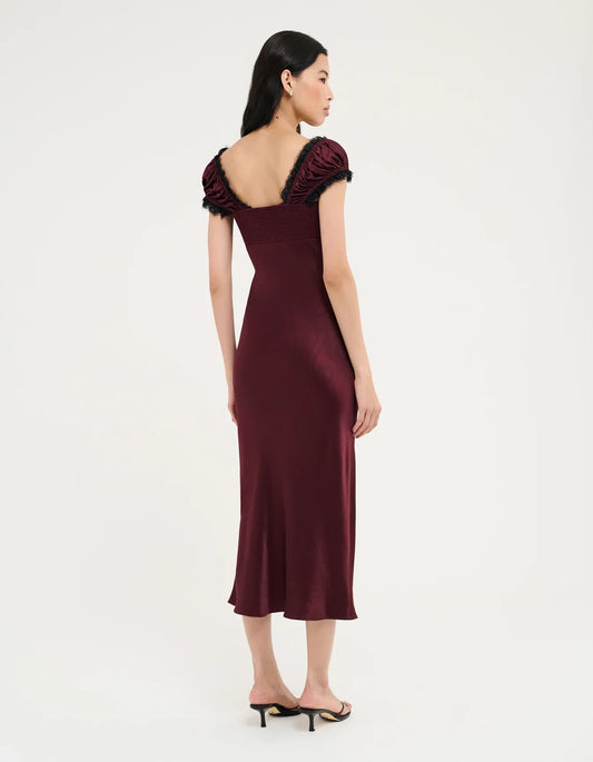 Burgundy midi dress with lace-trimmed short puff sleeves, fitted back view