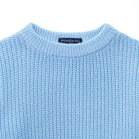 Baby blue textured knit baby sweater with ribbed crew neckline