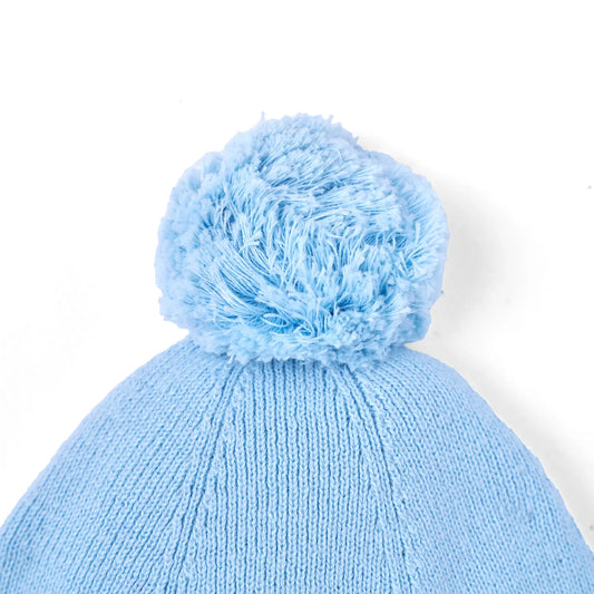 Baby blue knit beanie with large pom-pom and textured ribbed stitch crown