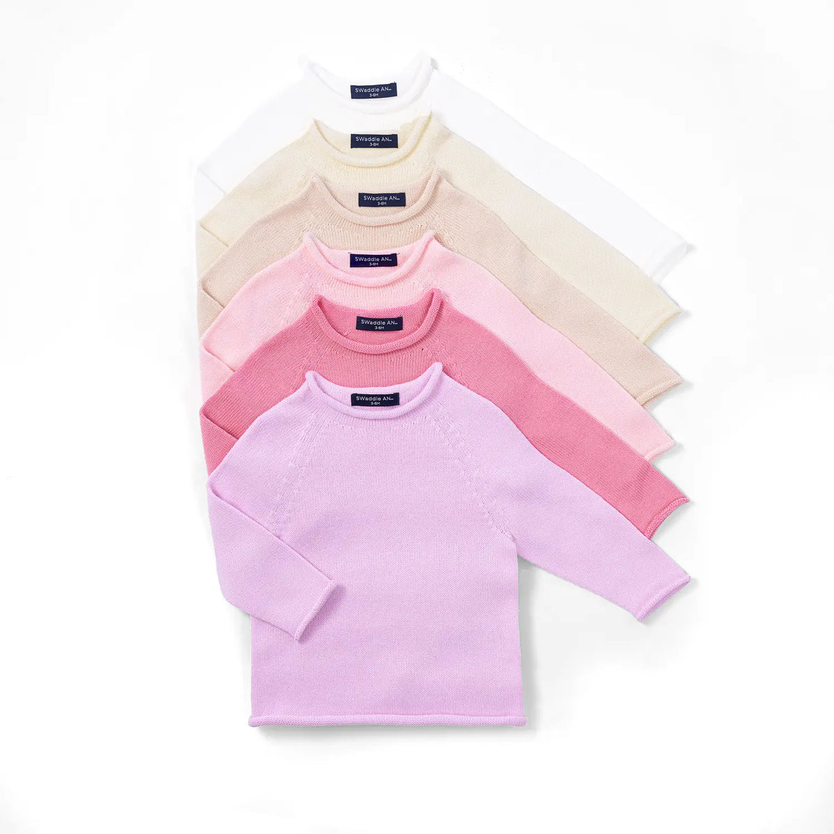 Set of baby knit rollneck sweaters, including rose pink