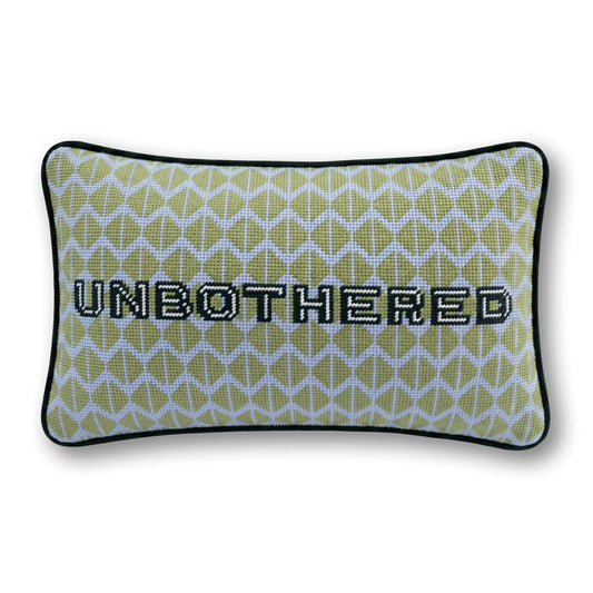 Green needlepoint throw pillow, black trim, rectangular, UNBOTHERED lettering