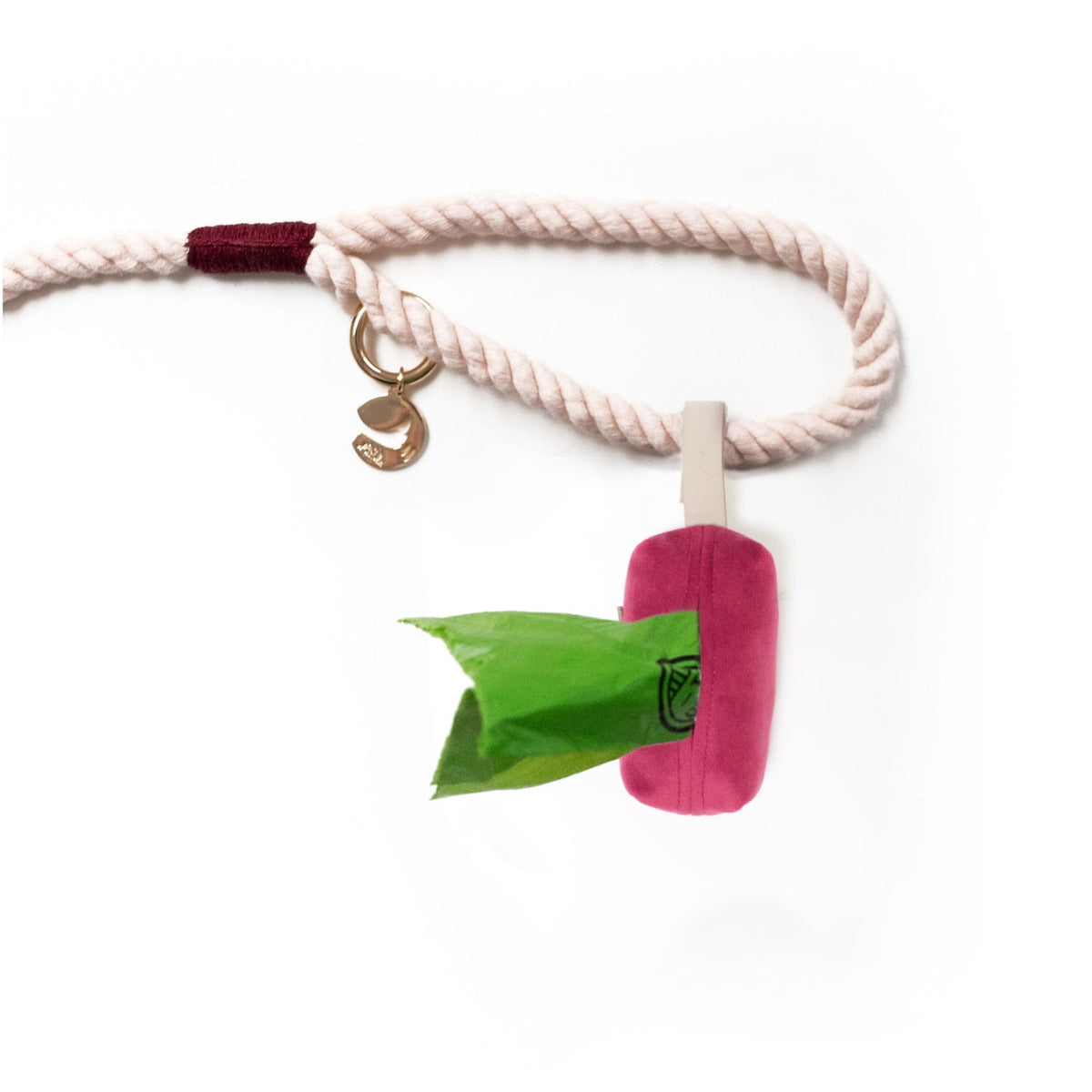 Velvet waste bag holder with rope loop, key ring, and green waste bag