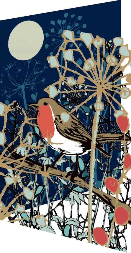 Close-up of Christmas card art: red robin, full moon, and laser-cut branches