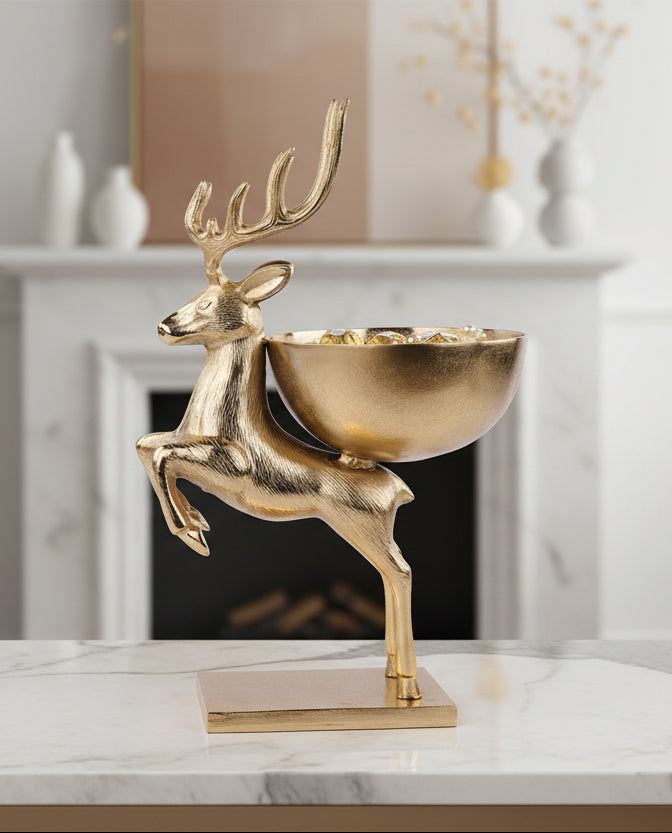23-inch gold-tone jumping deer bowl with a raised antlered figure and bowl on its back