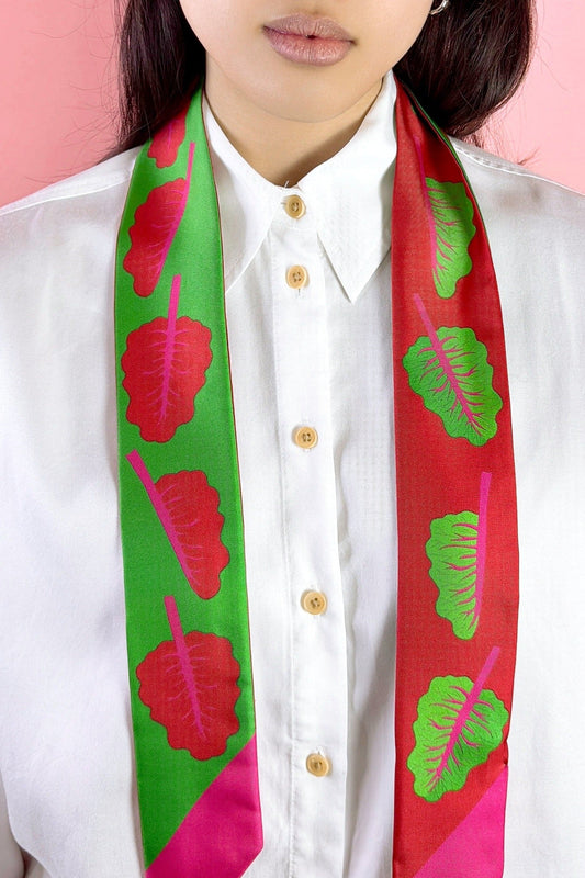 Twilly ribbon scarf in green and magenta leaf print worn with a white button shirt