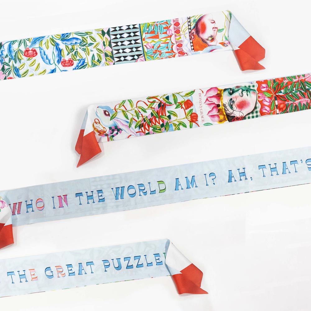 Silk twilly scarf flat, light blue and red border with multicolor fruit and text print