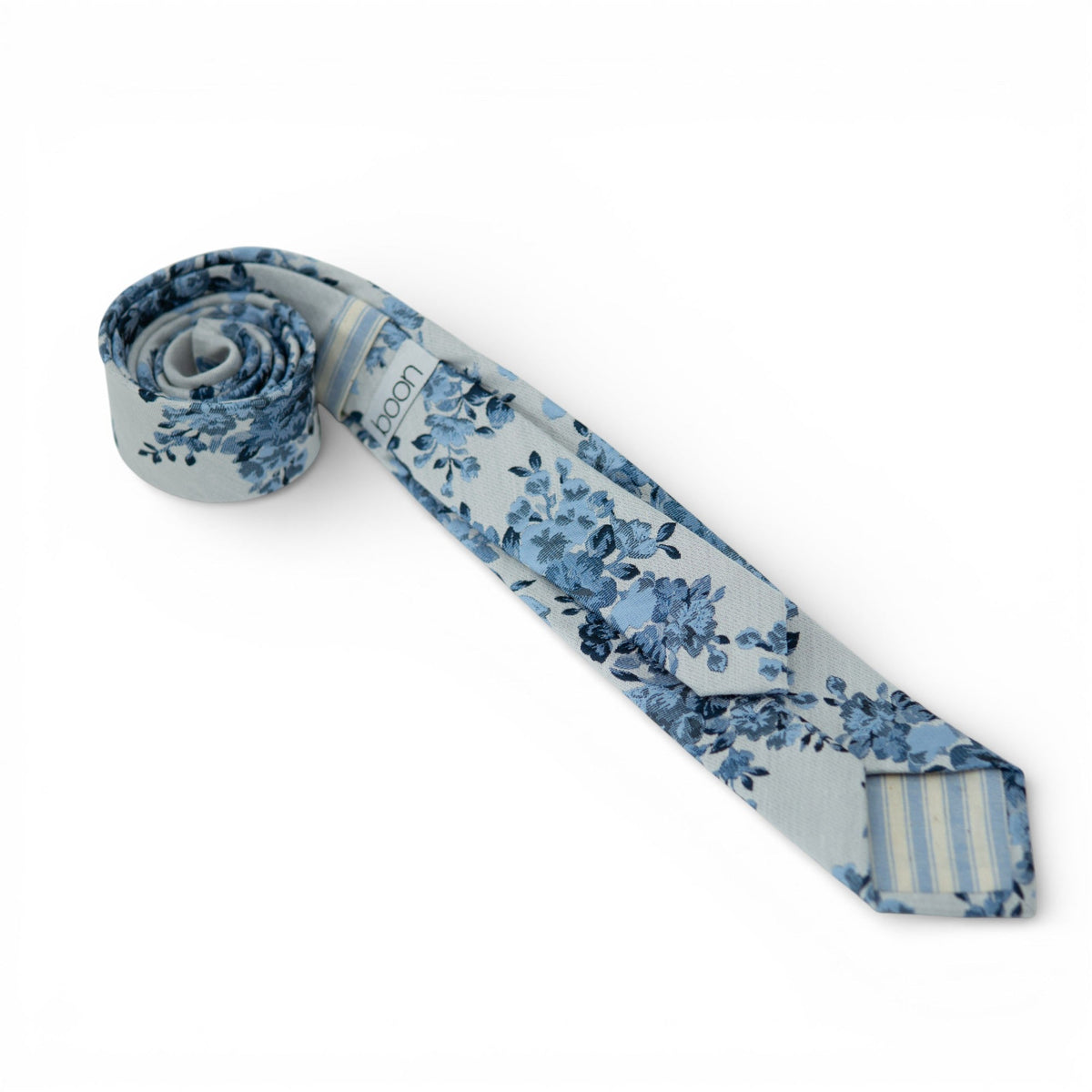 Men's light blue floral necktie with dark blue flowers and light blue stripe accents