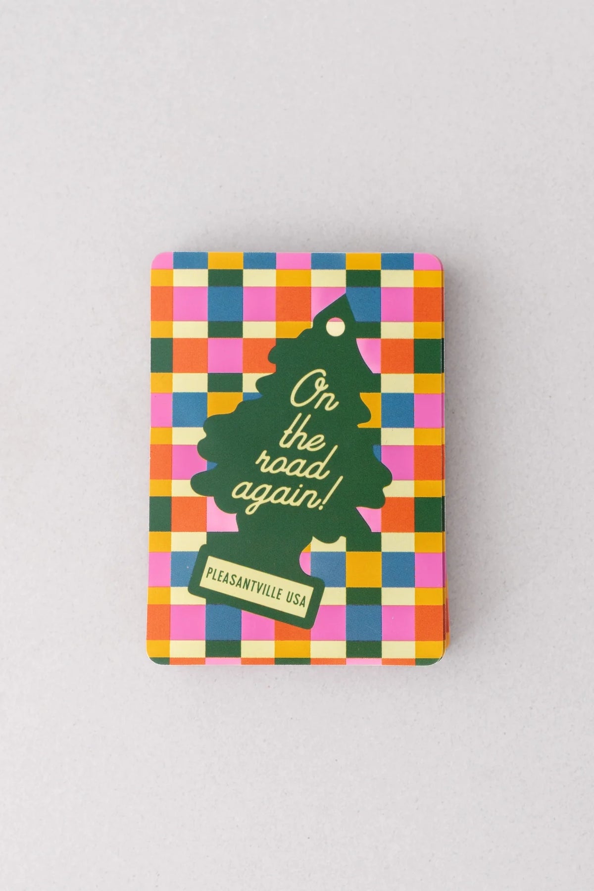 Colorful plaid playing card deck back with illustrated graphic and text