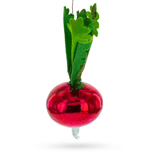 Red glass radish ornament with tall green leafy top and hanging loop