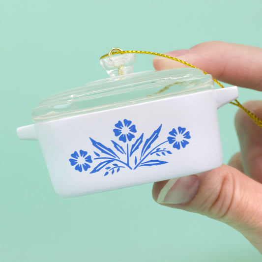 Mini casserole ornament, white with blue cornflower motif, clear lid, gold cord