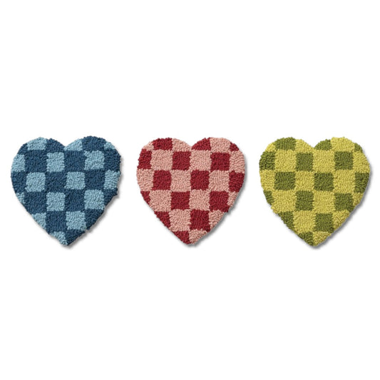 Tufted heart cotton trivets in blue, red, and green check pattern.