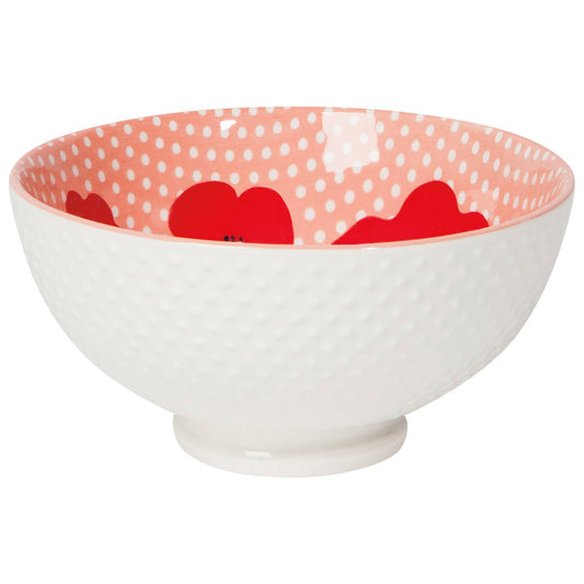 Poppy bowl with white sides and orange polka interior, red poppy-like shapes