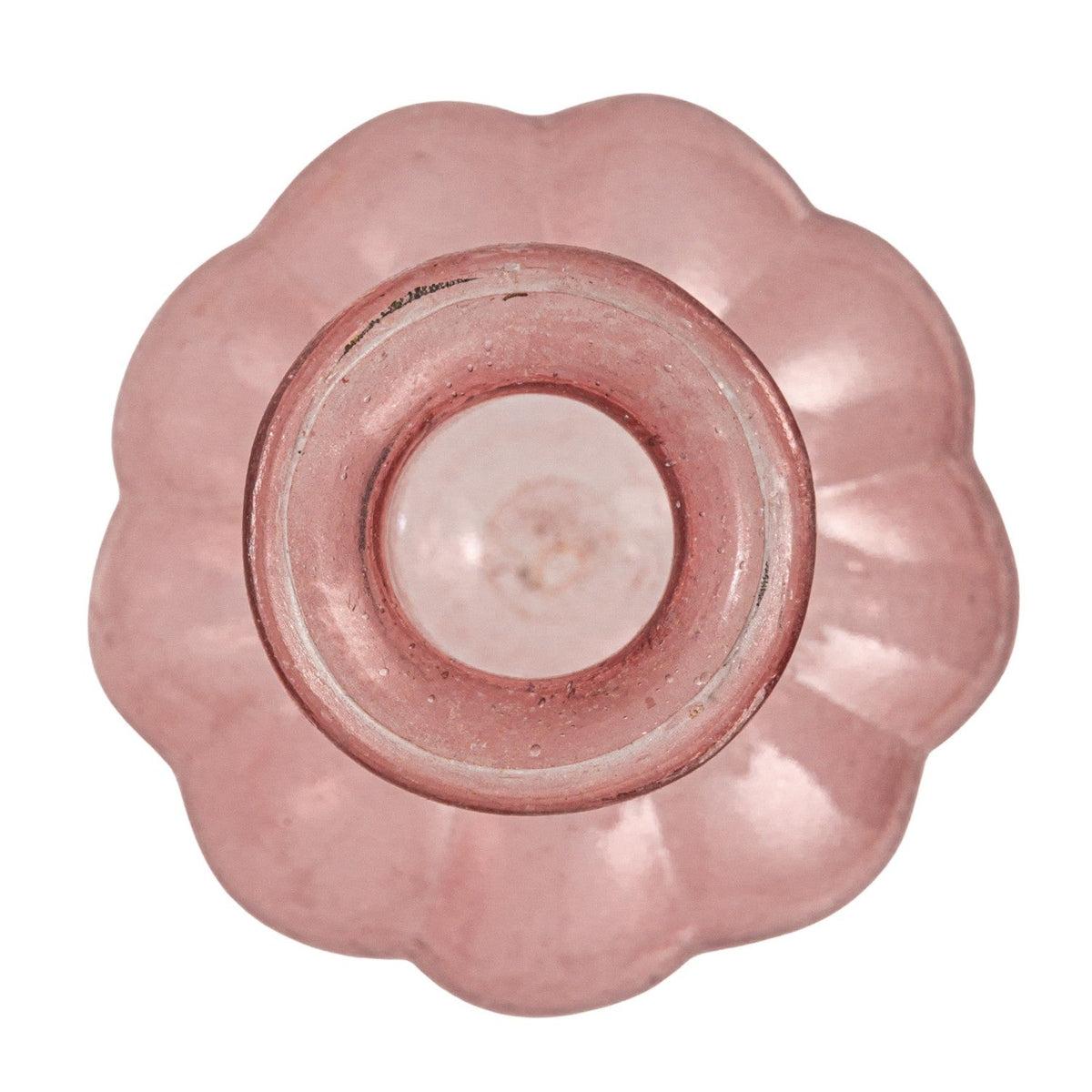 Pink hand-blown glass vase base close-up with circular opening and glass texture