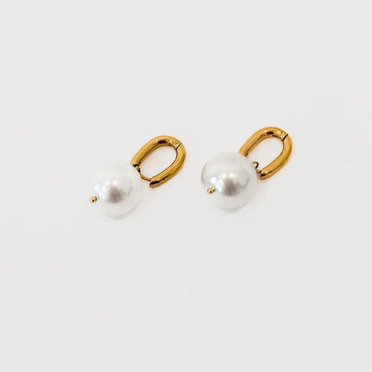 Gold-tone pearl drop huggie hoop earrings, pair view