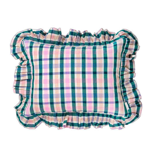 Plaid ruffle pillow with colorful grid pattern and gathered edges